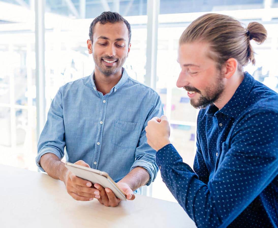 two men collaborating